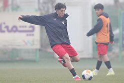 تمرین تیم ملی جوانان زیر بارش تند باران